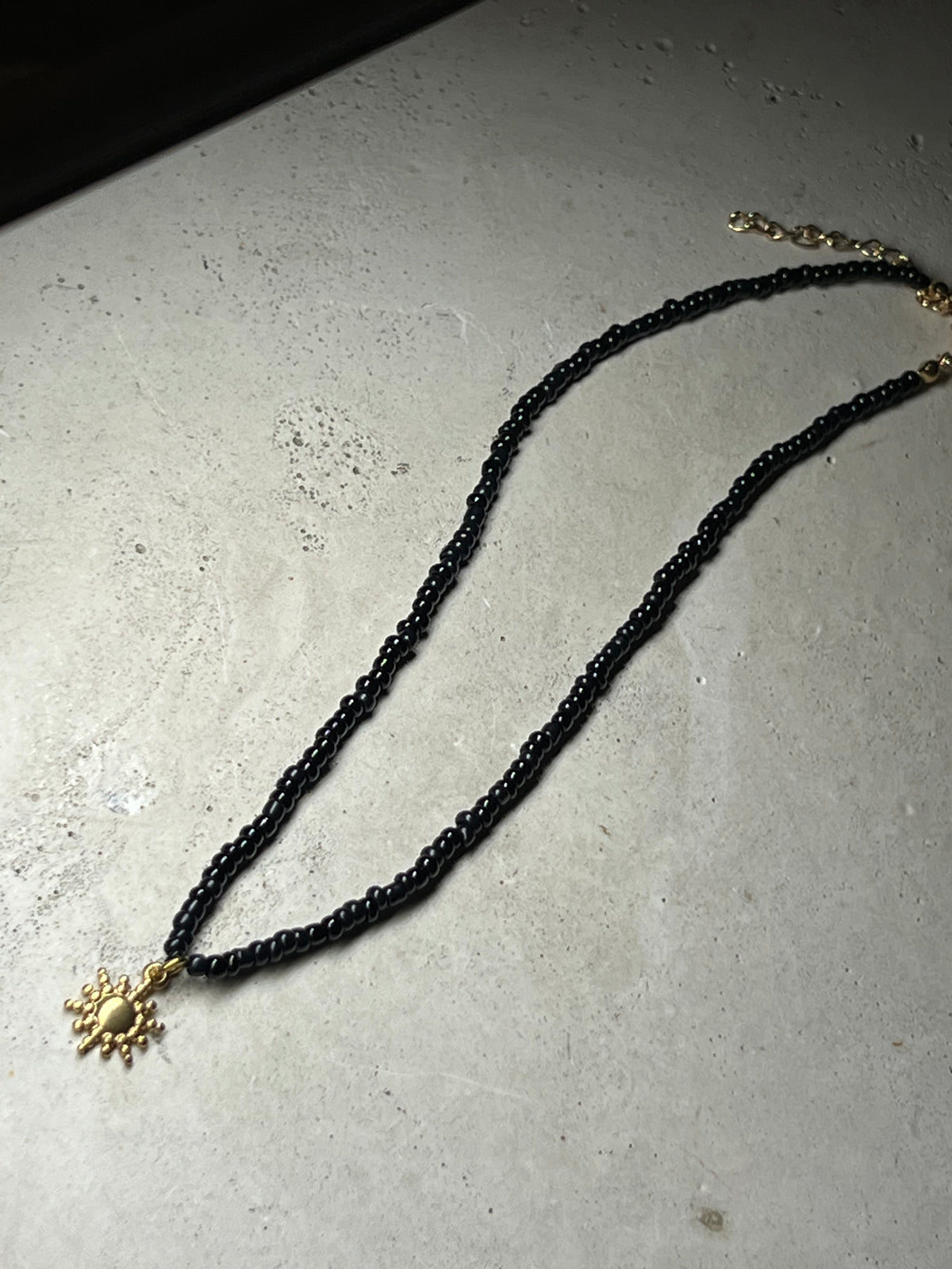 Cutie Perlenkette black Pearls with Sun