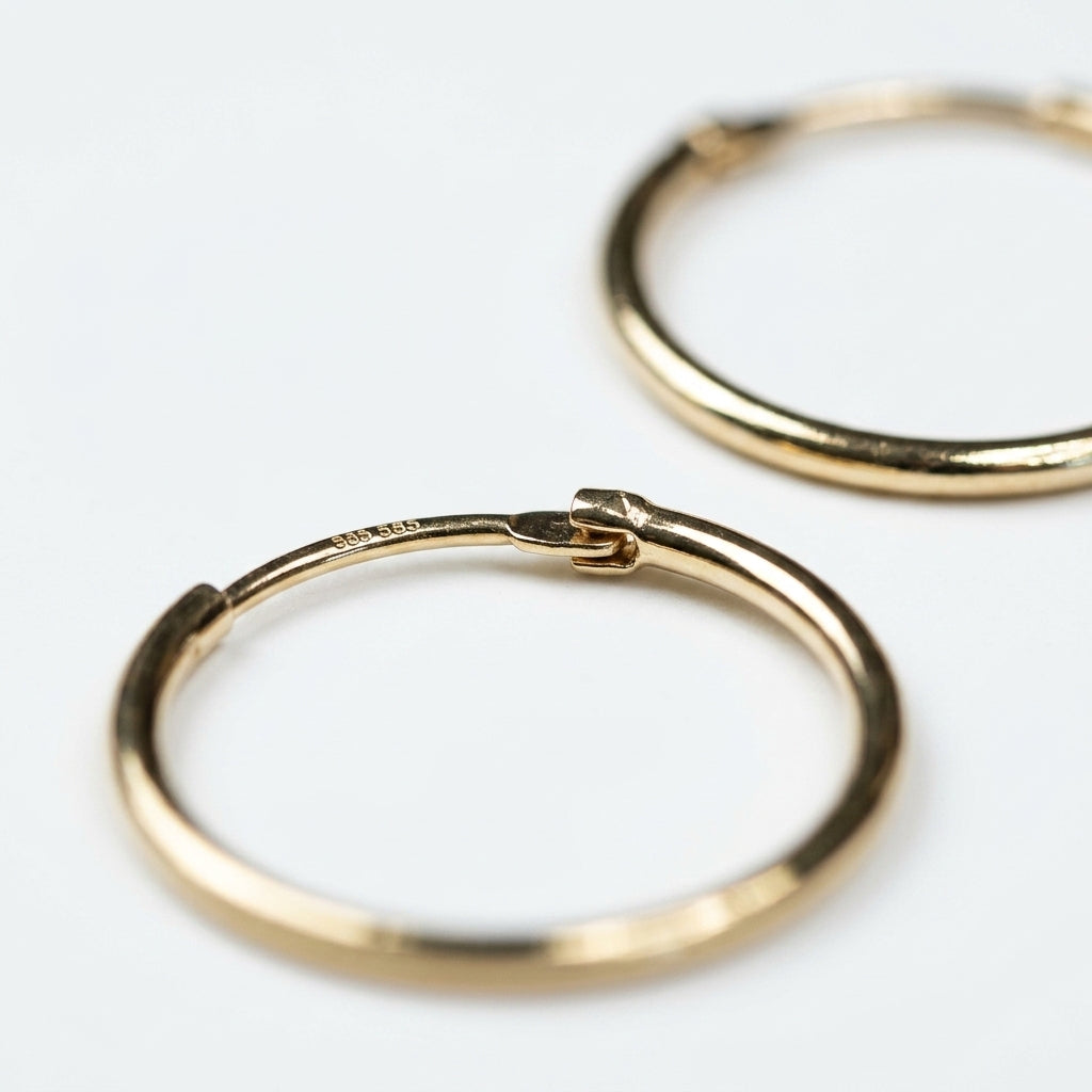 Gold Hoop Earrings — Macro Hallmark Detail | Generated by Modelize