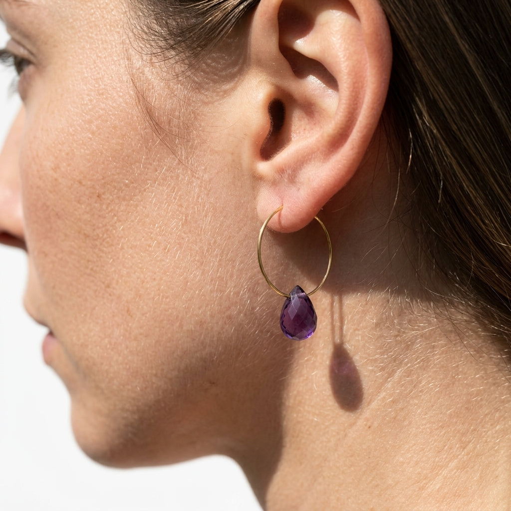 Hoop earrings with gemstone pendants — Macro Detail of Amethyst | Generated by Modelize
