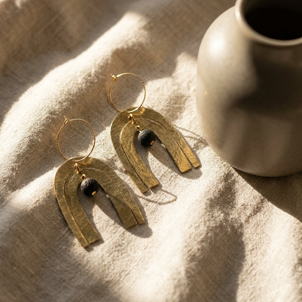 Arch drop hoop earrings — Lifestyle Still Life | Generated by Modelize